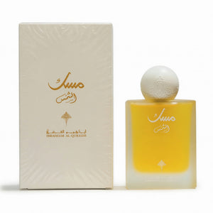 Perfume bottle and packaging with gold and white design on a white background